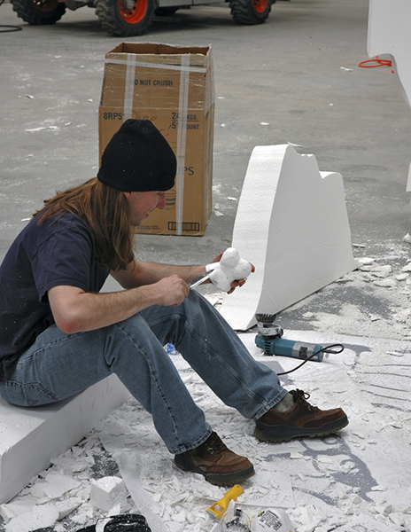 A younger me carving a pedal ungual. Look at that hair - what a hippy!